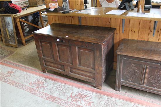 Mid 18th century oak panelled mule chest, the base fitted 3 small drawers